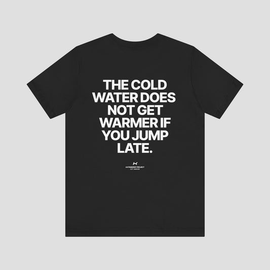 THE COLD WATER DOES NOT GET WARMER PREMIUM T-SHIRT